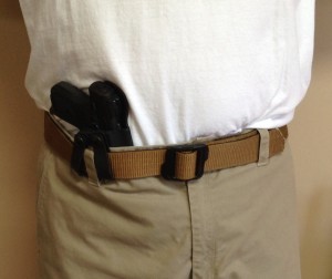 Some like it a little more to the 12 o'clock, but I put it here to show how the twin loops can straddle a belt loop.