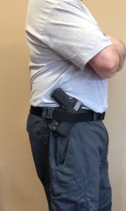 Outside the waistband, but inside the belt. Obviously, you need a cover garment here, unless you are open carrying.