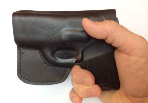 Holster allows for a good purchase, without crowding out the middle finger.