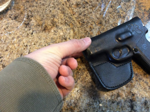 Use your fingers to mold the leather around the end of the gun.