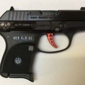 Ruger LCP Custom with red trigger and red laser